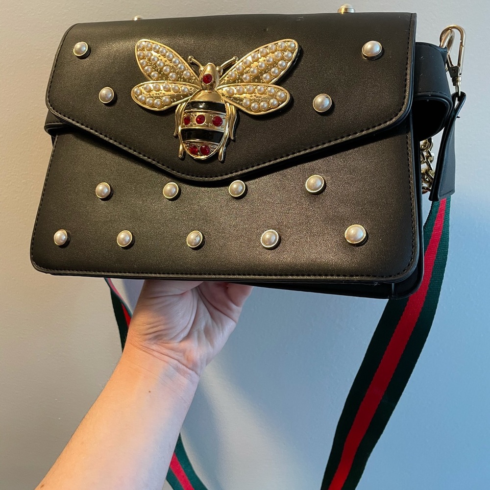 Black bag with insect embellishment and pearls
